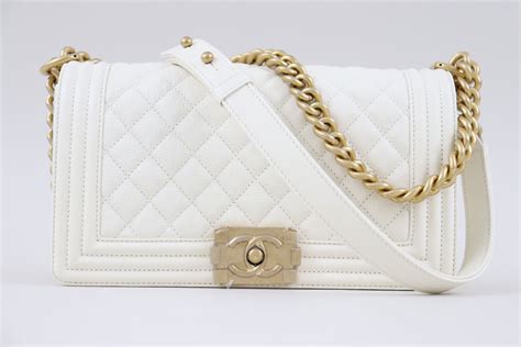 chanel white quilted caviar medium boy bag